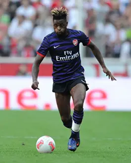 Cologne V Arsenal 2012-13 Prints: Alex Song in Action: Arsenal vs. FC Cologne Pre-Season Friendly (2012)
