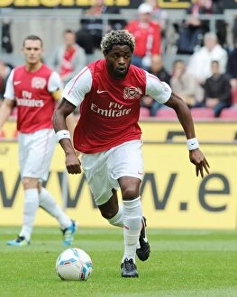 Cologne v Arsenal Collection: Alex Song in Action: Arsenal's Pre-Season Friendly vs Cologne