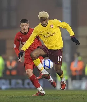 Leyton Orient v Arsenal - FA Cup 2010-2011 Collection: Alex Song (Arsenal) Alex Revell (Orient). Leyton Orient 1: 1 Arsenal, FA Cup Fifth Round