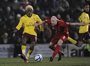 Leyton Orient v Arsenal - FA Cup 2010-2011 Collection: Alex Song (Arsenal) Andrew Whing (Orient). Leyton Orient 1: 1 Arsenal, FA Cup Fifth Round