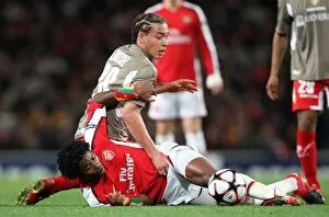 Arsenal v Standard Liege 2009-10 Collection: Alex Song (Arsenal) Axel Witsel (Liege)