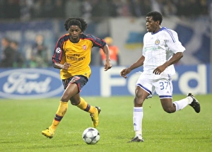 Dynamo Kiev v Arsenal 2008-09 Gallery: Alex Song (Arsenal) Ayila Yussuf (Dynamo Kiev)