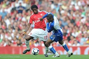 Arsenal v Wigan Athletic 2009-10 Collection: Alex Song (Arsenal) Charles N Zogbia (Wigan)