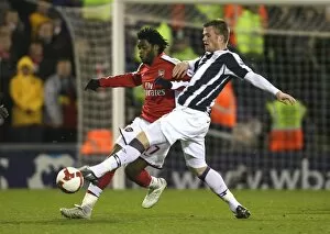Images Dated 3rd March 2009: Alex Song (Arsenal) Chris Brunt (West Brom)