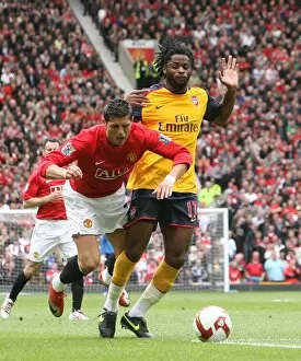 Manchester United v Arsenal 2008-09 Collection: Alex Song (Arsenal) Christiano Ronaldo (Man United)
