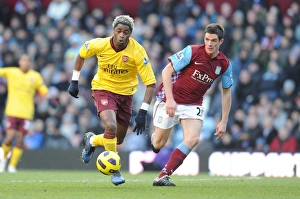 Aston Villa v Arsenal 2010-11 Gallery: Alex Song (Arsenal) Ciaran Clark (Villa). Aston Villa 2: 4 Arsenal. Barclays Premier League