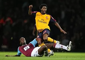 West Ham United v Arsenal 2008-09 Collection: Alex Song (Arsenal) is fouled by Carlton Cole (West Ham)