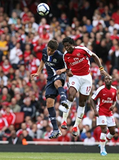 Images Dated 4th October 2009: Alex Song (Arsenal) Franco Di Santo (Blackburn)