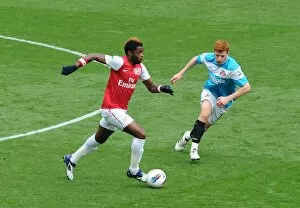 Alex Song (Arsenal) Jack Colback (Sunderland). Arsenal 2: 1 Sunderland. Barclays Premier League