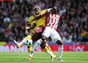 Images Dated 8th May 2011: Alex Song (Arsenal) Kenwyne Jones (Stoke). Stoke City 3: 1 Arsenal, Barclays Premier League