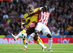 Images Dated 8th May 2011: Alex Song (Arsenal) Kenwyne Jones (Stoke). Stoke City 3: 1 Arsenal, Barclays Premier League