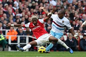 Images Dated 30th October 2010: Alex Song (Arsenal) Luis Boa Morte (West Ham). Arsenal 1: 0 West Ham United