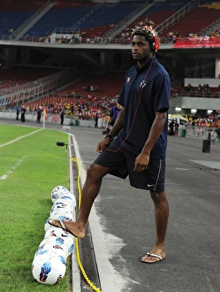 Malaysia XI V Arsenal Prints: Alex Song (Arsenal). Malaysia XI 0: 4 Arsenal, Bukit Jalil Stadium, Kuala Lumpur