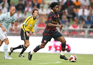 Alex Song (Arsenal) Massimo Mutarelli (Lazio)