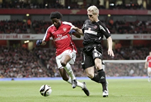 Alex Song (Arsenal) Matthew Kilgallon (Sheffield)