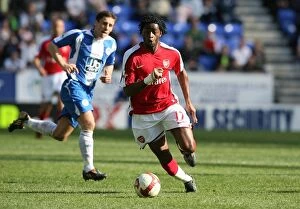 Images Dated 11th April 2009: Alex Song (Arsenal) Michael Brown (Wigan)