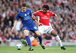 Arsenal v Manchester United - Champions League 2008-09 Collection: Alex Song (Arsenal) Michael Carrick (Man Utd)