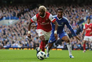 Chelsea v Arsenal 2010-11 Collection: Alex Song (Arsenal) Mikel (Chelsea). Chelsea 2: 0 Arsenal, Barclays Premier League