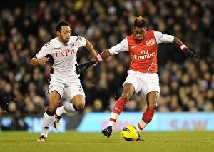 Fulham v Arsenal 2011-12 Gallery: Alex Song (Arsenal) Mousa Dembele (Fulham). Fulham 2: 1 Arsenal. Barclays Premier League