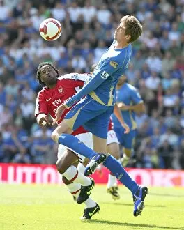 Images Dated 2nd May 2009: Alex Song (Arsenal) Peter Crouch (Portsmouth)