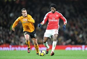 Images Dated 19th December 2009: Alex Song (Arsenal) Richard Garcia (Hull). Arsenal 3: 0 Hull City, Barclays Premier league
