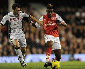 Fulham v Arsenal 2011-12 Gallery: Alex Song (Arsenal) Stephen Kelly (Fulham). Fulham 2: 1 Arsenal. Barclays Premier League