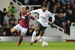 West Ham United v Arsenal FA Cup 2009-10 Collection: Alex Song (Arsenal) Valon Behrami (West Ham). West Ham United 1: 2 Arsenal