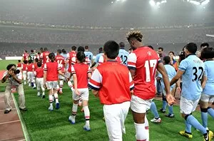 Images Dated 27th July 2012: Alex Song (Arsenal) walsk out to the pitch. Arsenal 0: 2 Manchester City
