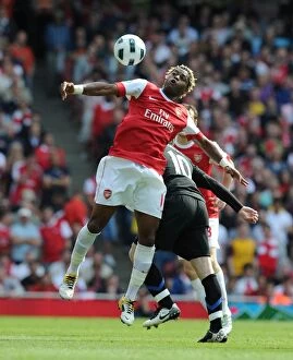 Arsenal v Manchester United 2010-2011 Collection: Alex Song (Arsenal) Wayne Rooney (Man Utd). Arsenal 1: 0 Manchester United