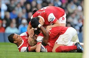 Manchester City v Arsenal 2010-11 Collection: Alex Song celebrates scoring the 2nd Arsenal goal Marouane Chamakh, Sami Nasri