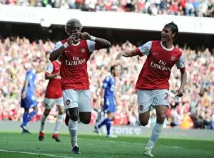 Arsenal v Bolton Wanderers 2010-11 Collection: Alex Song celebrates scoring the 3rd Arsenal goal with Marouane Chamakh