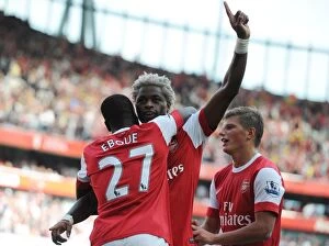 Arsenal v Bolton Wanderers 2010-11 Collection: Alex Song celebrates scoring the 3rd Arsenal goal with Emmanuel Eboue and Andrey Arshavin