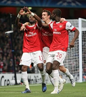 Arsenal v Shaktar Donetsk 2010 - 11 Collection: Alex Song celebrates scoring Arsenals 1st goal with Sebastien Squillaci