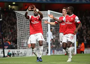 Alex Song celebrates scoring Arsenals 1st goal with Sebastien Squillaci