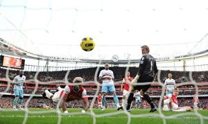 Images Dated 30th October 2010: Alex Song heads past West Ham goalkeeper Rob Green to score the Arsenal goal