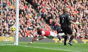 Alex Song heads past West Ham goalkeeper Rob Green to score the Arsenal goal Alex Song heads past West Ham goalkeeper Rob Green to score the Arsenal goal