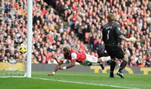 Arsenal V West Ham United 2010-11 Prints: Alex Song heads past West Ham goalkeeper Rob Green to score the Arsenal goal