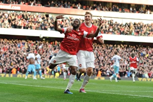 Arsenal V West Ham United 2010-11 Prints: Alex Song and Nicklas Bendtner