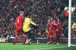 Song Alexandre Collection: Alex Song scores Arsenals 4th goal under pressure from Sami Hyypia (Liverpool)