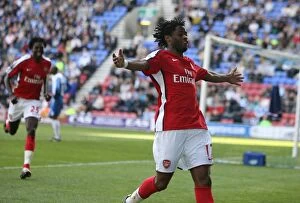 Wigan Athletic v Arsenal 2008-09 Collection: Alex Song's Thrilling Goal Celebration: Arsenal's Unforgettable 4-1 Victory Over Wigan Athletic