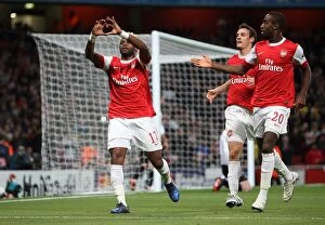 Images Dated 19th October 2010: Alex Song's Thrilling Goal Celebration with Squillaci and Djourou