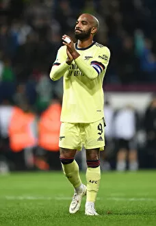 Images Dated 25th August 2021: Alexandre Lacazette Celebrates Arsenal's Carabao Cup Victory over West Bromwich Albion