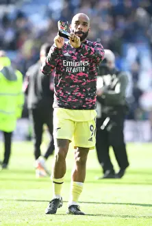 Alexandre Lacazette Celebrates with Fans: Leicester City vs. Arsenal, 2021-22 Premier League