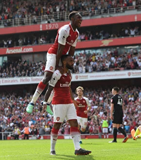 Arsenal v West Ham United 2017-18 Collection: Alexandre Lacazette and Danny Welbeck Celebrate Goal: Arsenal's Triumph Over West Ham United