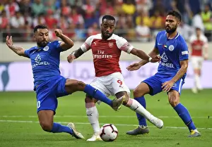Al-Nasr Dubai SC V Arsenal 2018-19 Prints: Alexandre Lacazette Faces Off Against Masoud Sulaiman in Al-Nasr Dubai SC vs Arsenal Friendly