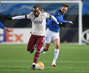 Molde FK V Arsenal 2020-21 Prints: Alexandre Lacazette Faces Off Against Molde: Arsenal's Europa League Battle