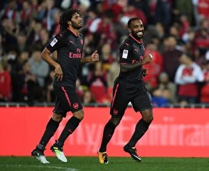 Images Dated 13th July 2017: Alexandre Lacazette and Mohamed Elneny Celebrate Goals in Sydney FC vs Arsenal Pre-Season Friendly