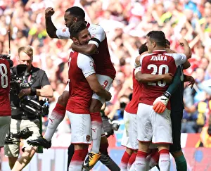 Alexandre Lacazette and Olivier Giroud (Arsenal) celebrate winning the penalty shoot out Alexandre Lacazette and Olivier Giroud (Arsenal) celebrate winning the penalty shoot out