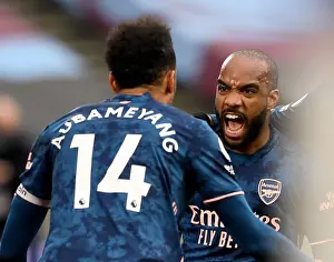 Alexandre Lacazette and Pierre-Emerick Aubameyang Celebrate Arsenal's Goals Against West Ham United in Premier League