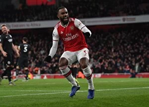 Images Dated 6th December 2019: Alexandre Lacazette's Thrilling Goal: Arsenal's Triumph Over Brighton & Hove Albion